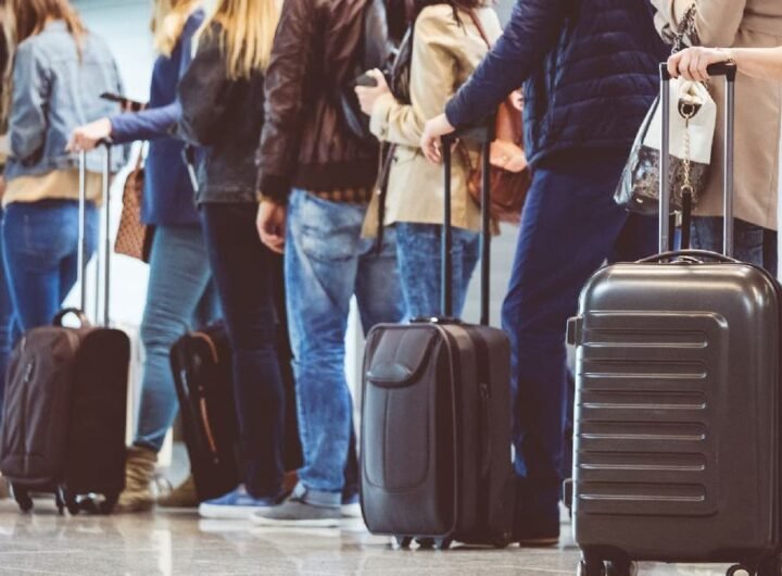 Passengers line up to get on plane